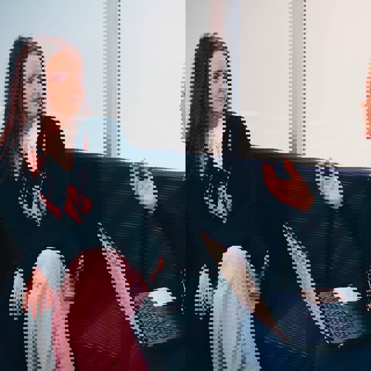 A young woman talking to a careers support adviser