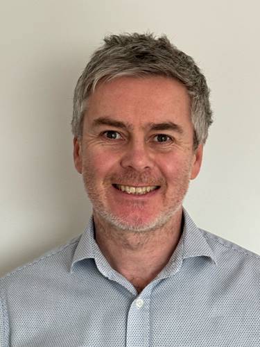 Man facing the camera wearing a shirt