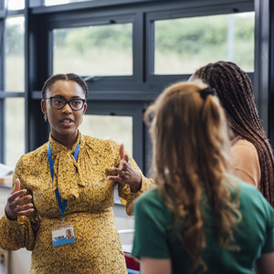 People talking in a group at a business event