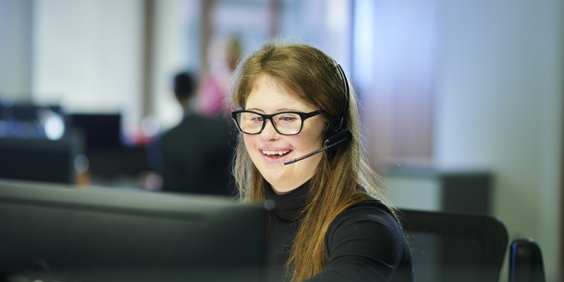 A Young Person Working In An Office