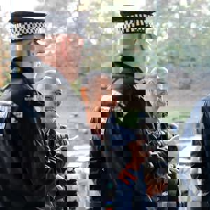 Police officer and Alison Lowe, West Yorkshire Deputy Mayor for Policing and Crime, speaking to people