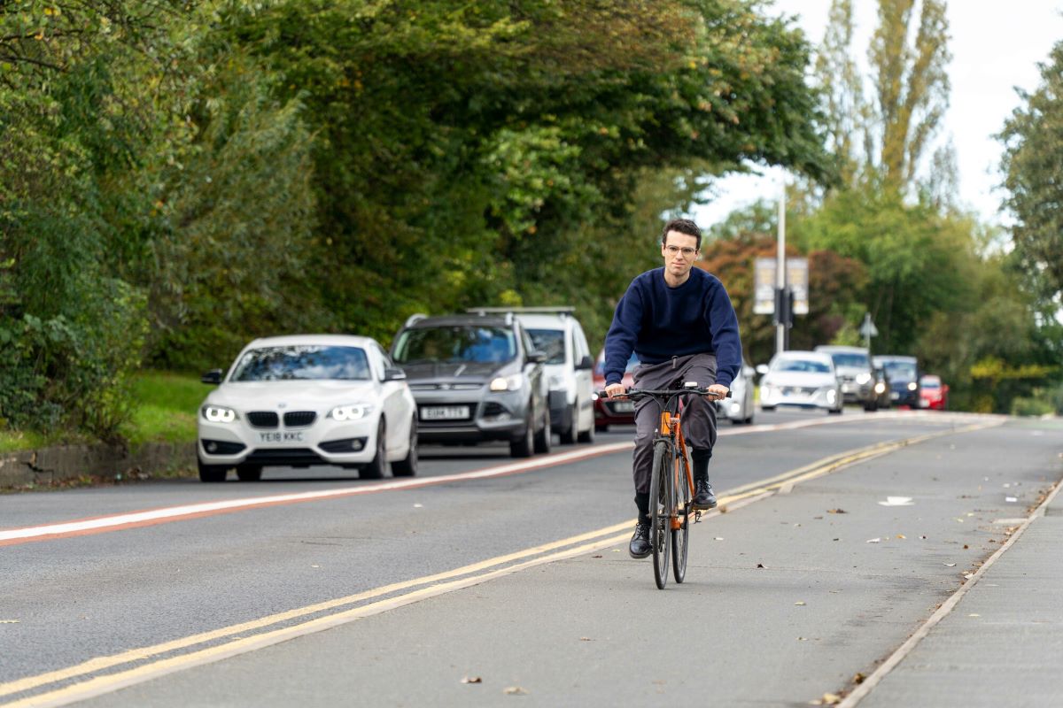A cyclist in a cycle lane in Leeds