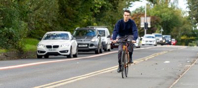A cyclist in a cycle lane in Leeds
