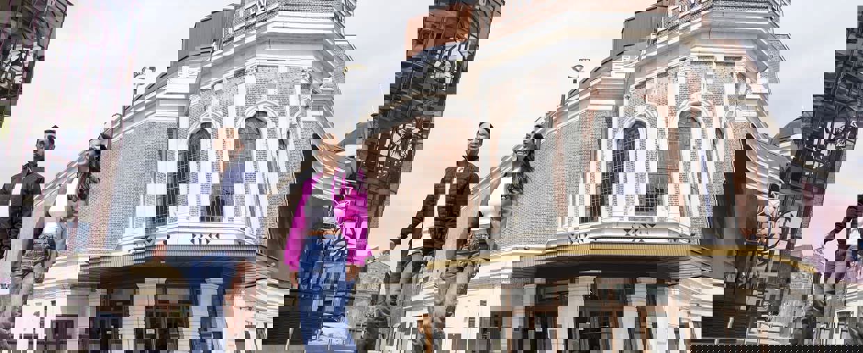 Couple walking outside Bradford Live 